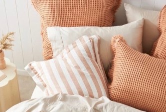 bedroom makeover cosy soft furnishings and warm hues